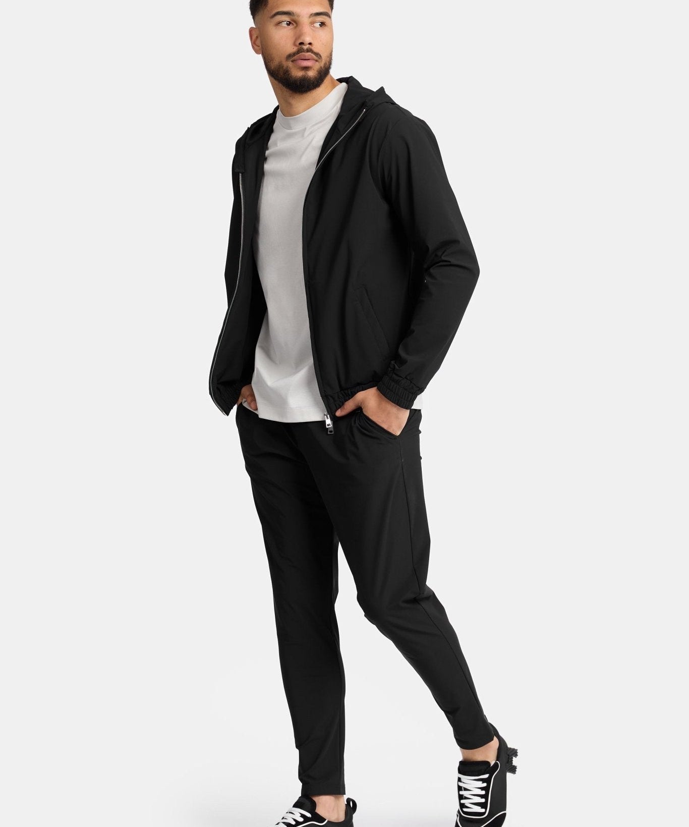 Onyx Black Hooded Tech Suit - Ultimate Comfort & Style Homme8 Trainingspak