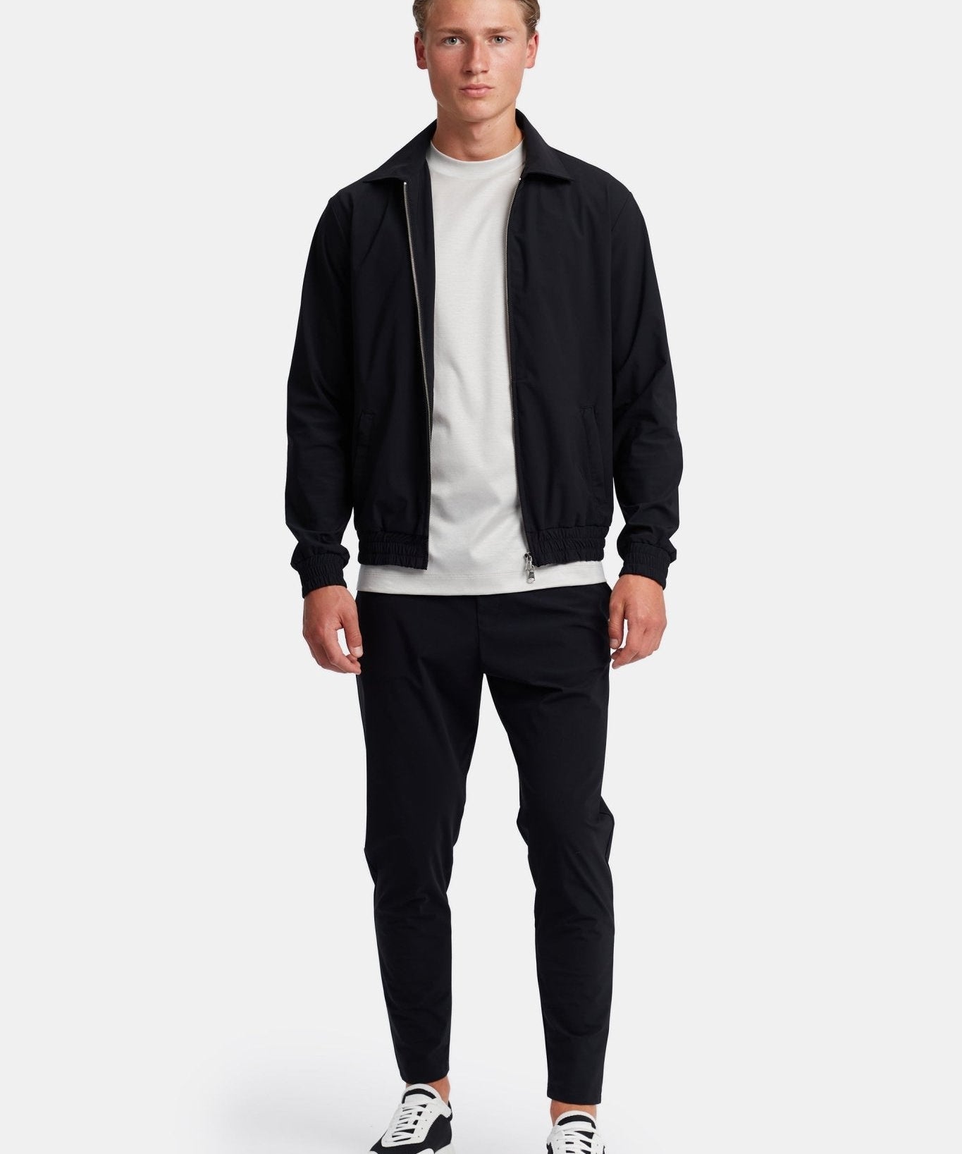 Onyx Black Tech Suit: Sleek Performance Wear for Modern Professionals Homme8 Trainingspak