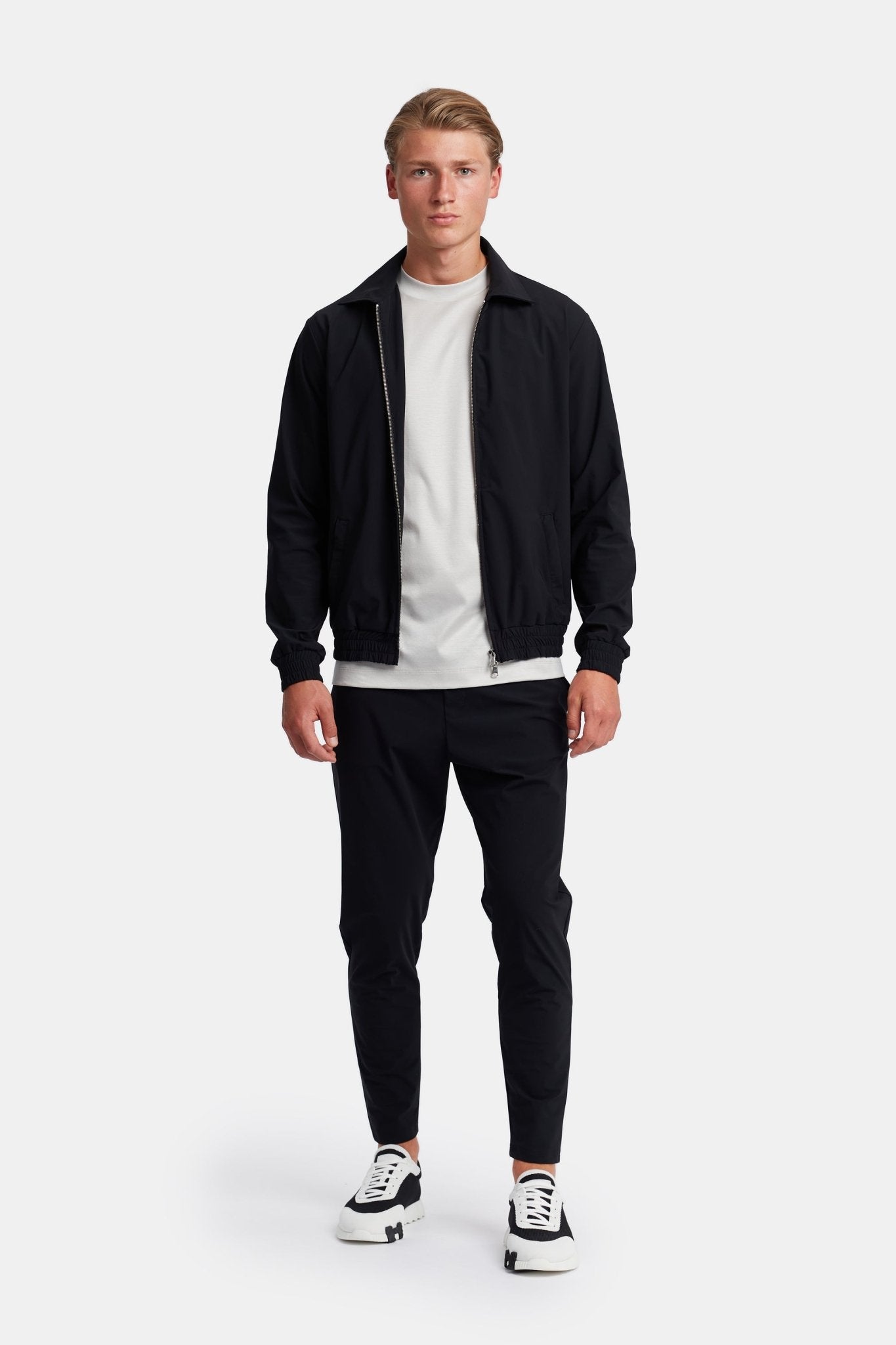 Onyx Black Tech Suit: Sleek Performance Wear for Modern Professionals Homme8 Trainingspak