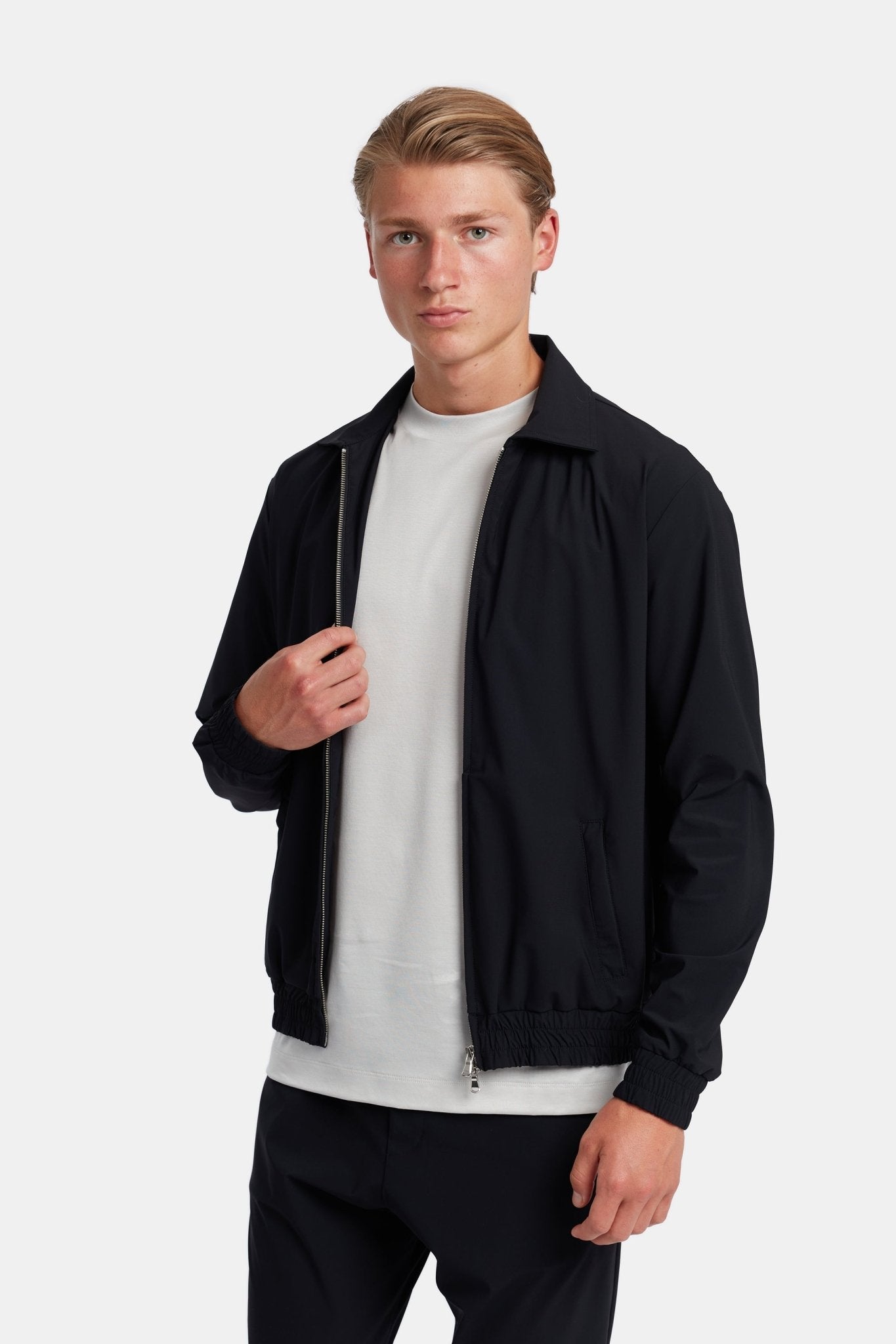 Onyx Black Tech Suit: Sleek Performance Wear for Modern Professionals Homme8 Trainingspak