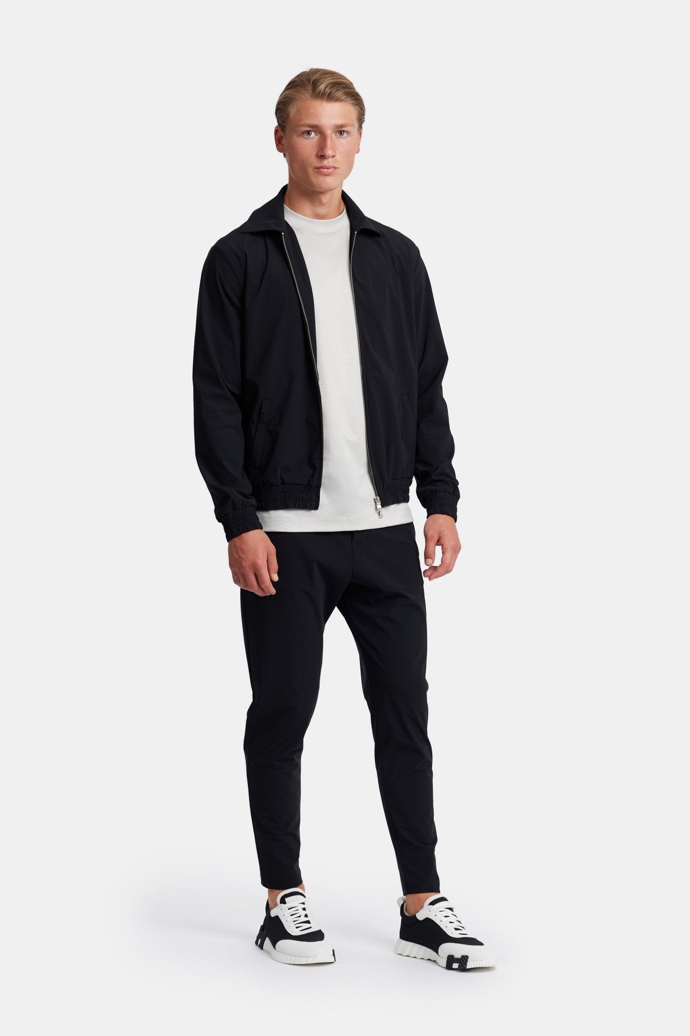 Onyx Black Tech Suit: Sleek Performance Wear for Modern Professionals Homme8 Trainingspak